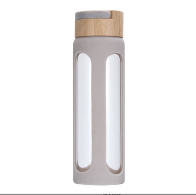 Αγορά Προσαρμοσμένο 550/750ml High Borosilicate γυάλινο μπουκάλι νερού Custom γυάλινο μπουκάλι ποτού με σιλικόνιο μανίκι και κάλυμμα από μπαμπού εύκολο στο καθαρισμό και τη συντήρηση online manufacture